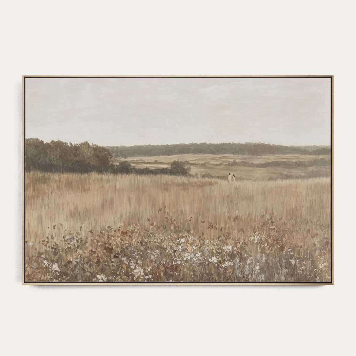 Framed landscape painting of a field with trees and sky. 