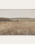 framed landscape painting of a field with trees and sky. 