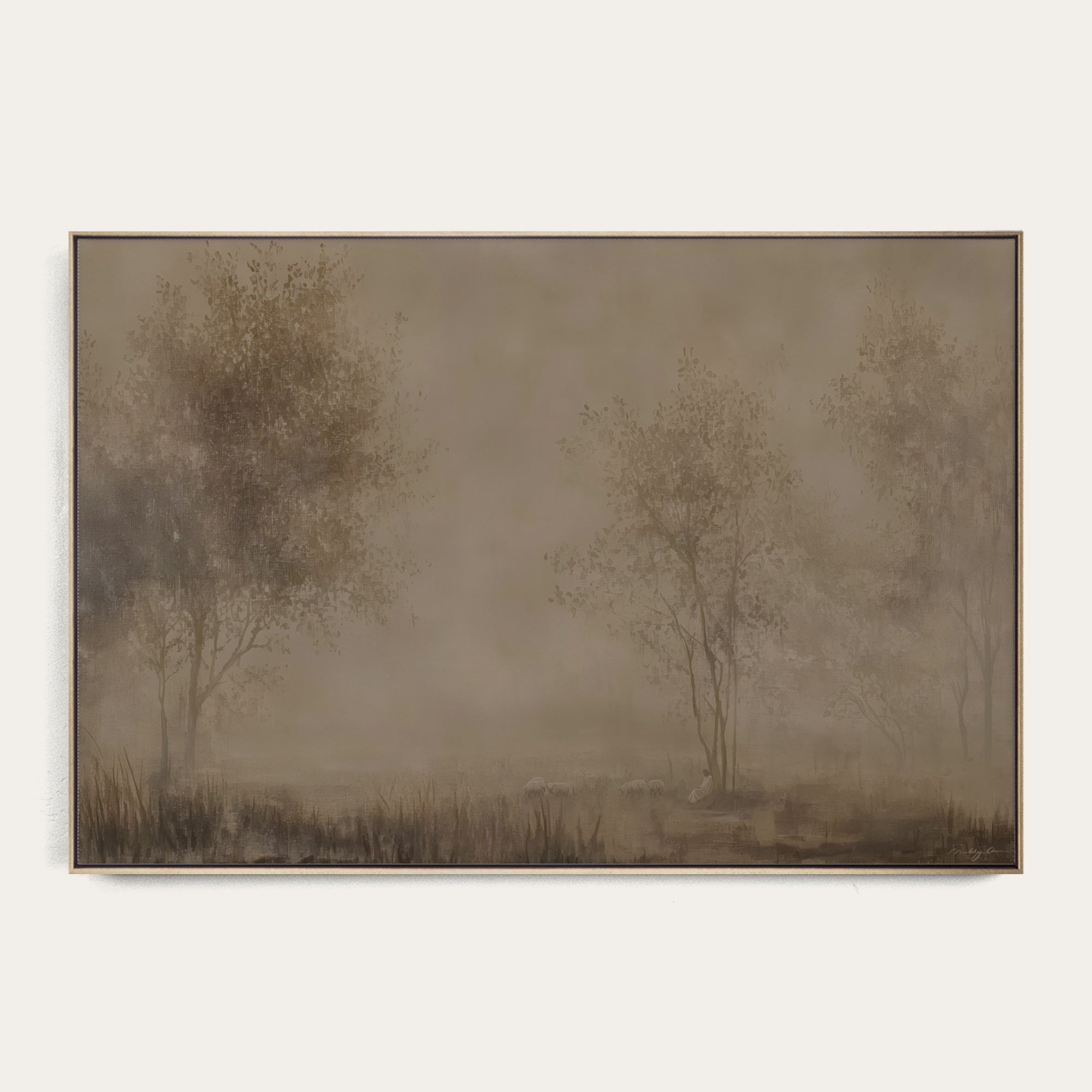 Framed artwork of a misty landscape with trees on a plain background 