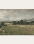 framed painting of a landscape with a figure walking on a path. 