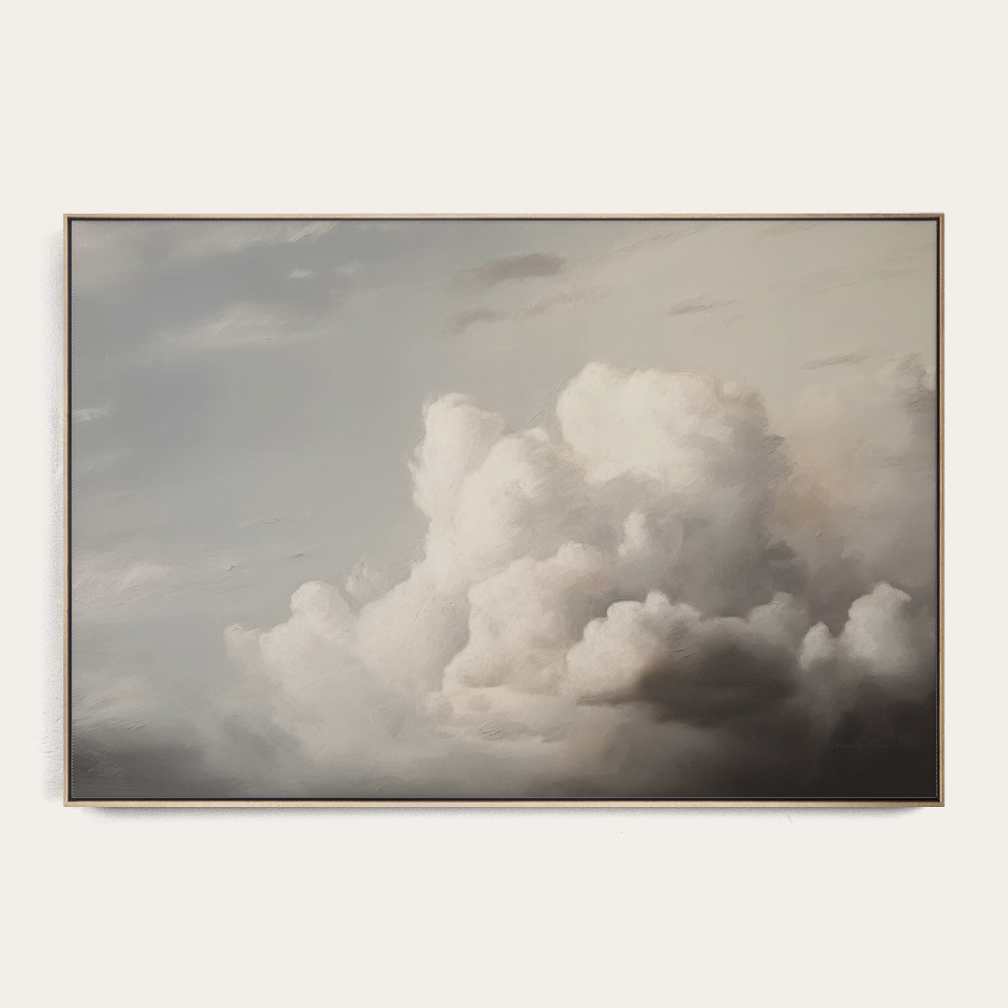 Framed artwork of a cloud in a gray sky 