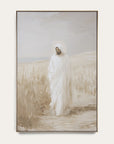 framed artwork of a person in a white robe standing in a field with a neutral background 