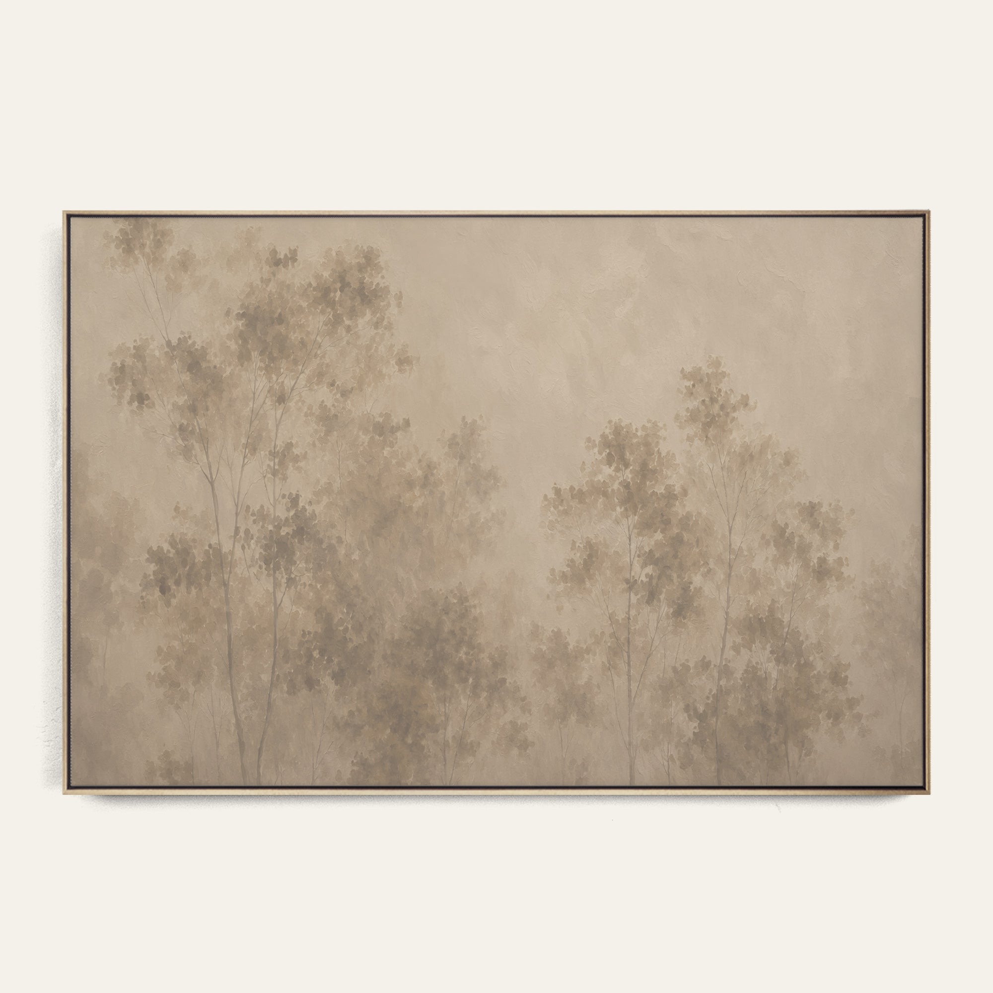 A framed landscape art print featuring a misty, minimalist forest of trees in muted beige and brown tones, displayed on a clean off-white wall. 