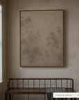 A large framed wall art print with a minimalist tree design in muted beige and gray tones, displayed in a real interior setting above a wooden bench, with a text label in the corner reading 'FLOATER WALNUT | 30 x 40'.