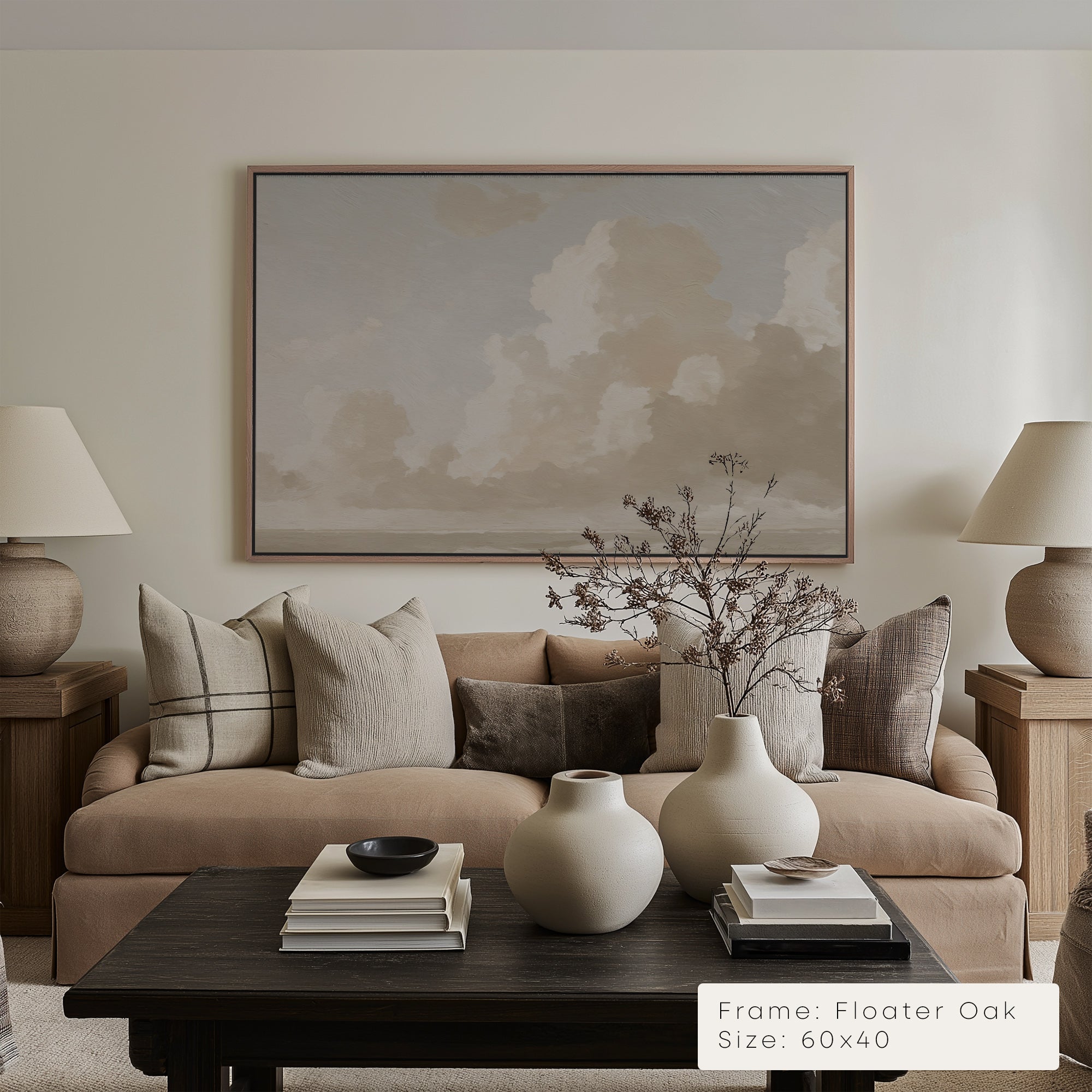 Living room with beige sofa, decorative pillows, and a coffee table with vases.