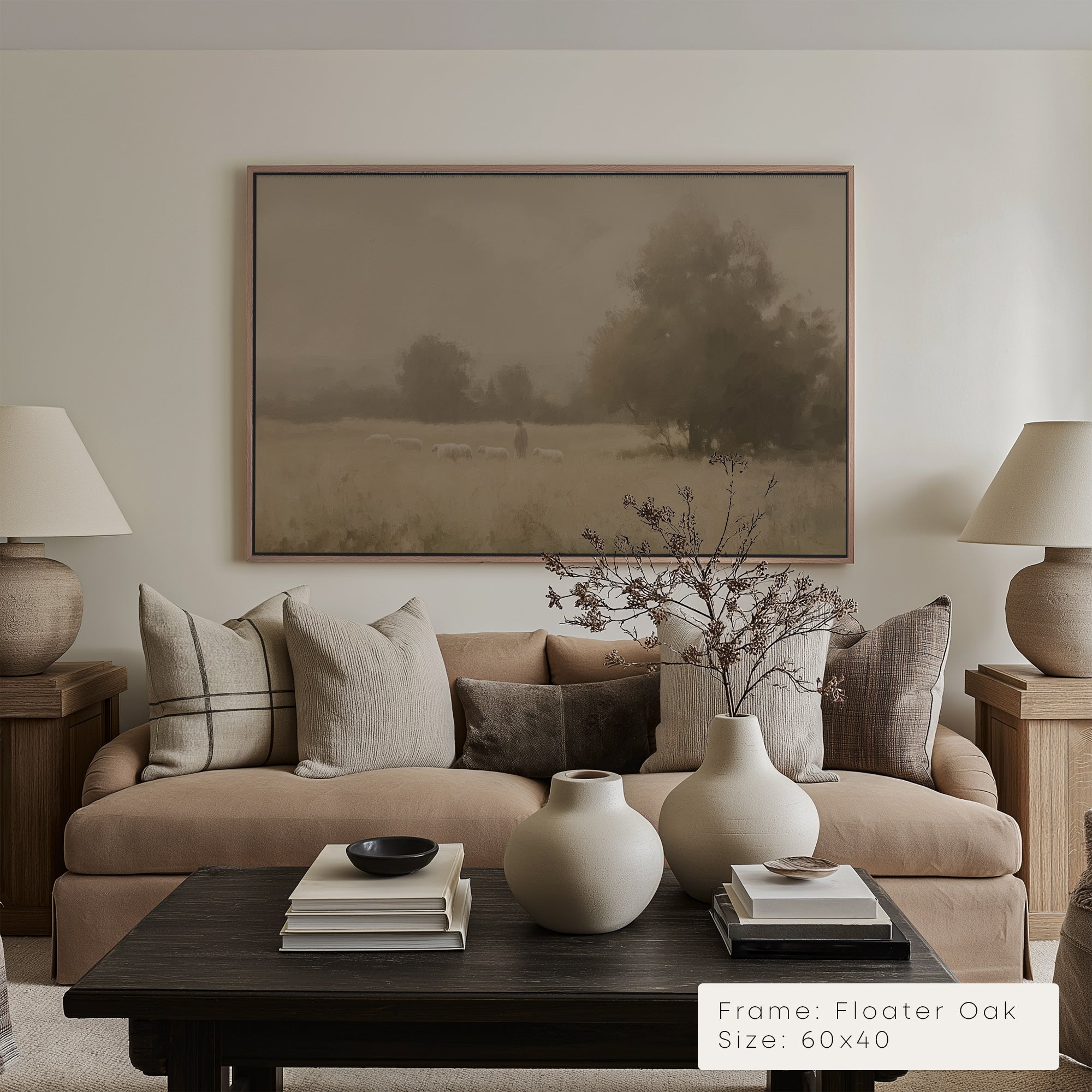 Living room with a beige sofa, wooden coffee table, and framed landscape art on the wall.