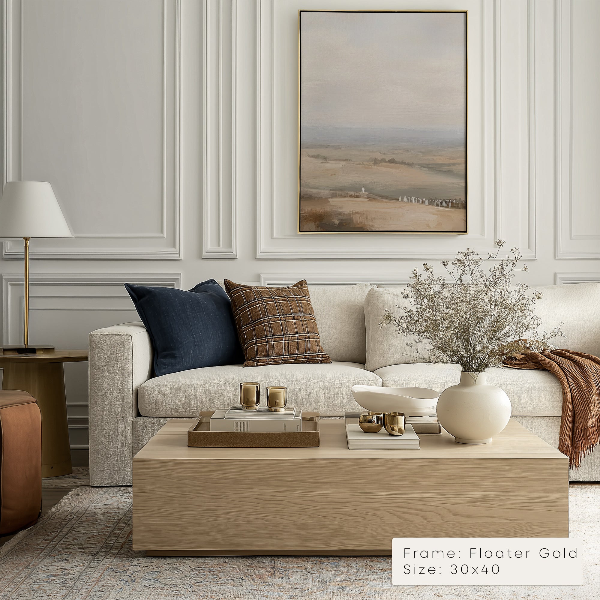 Living room with a beige sofa, coffee table, and wall art