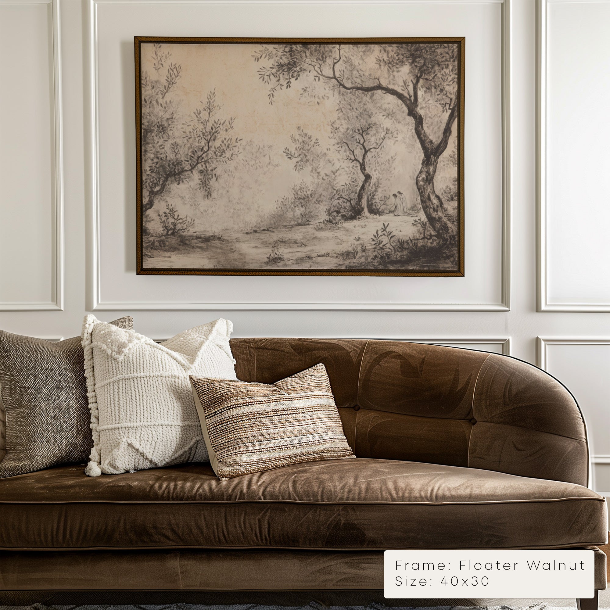 Brown sofa with decorative pillows in a room with a framed landscape painting on the wall.