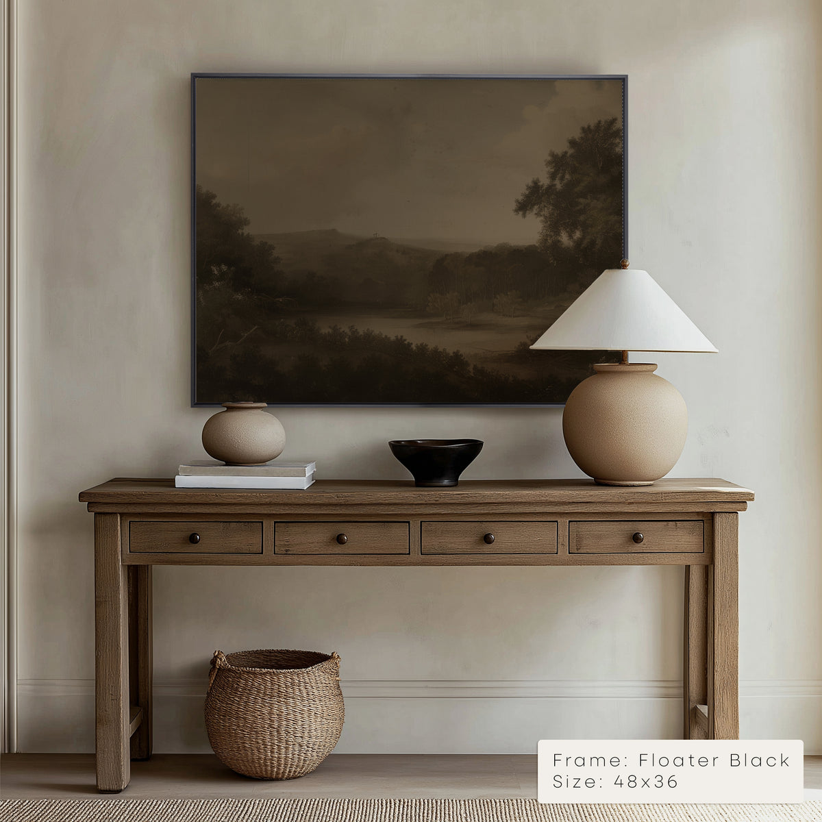 Wooden console table with decorative items against a beige wall with a landscape painting.