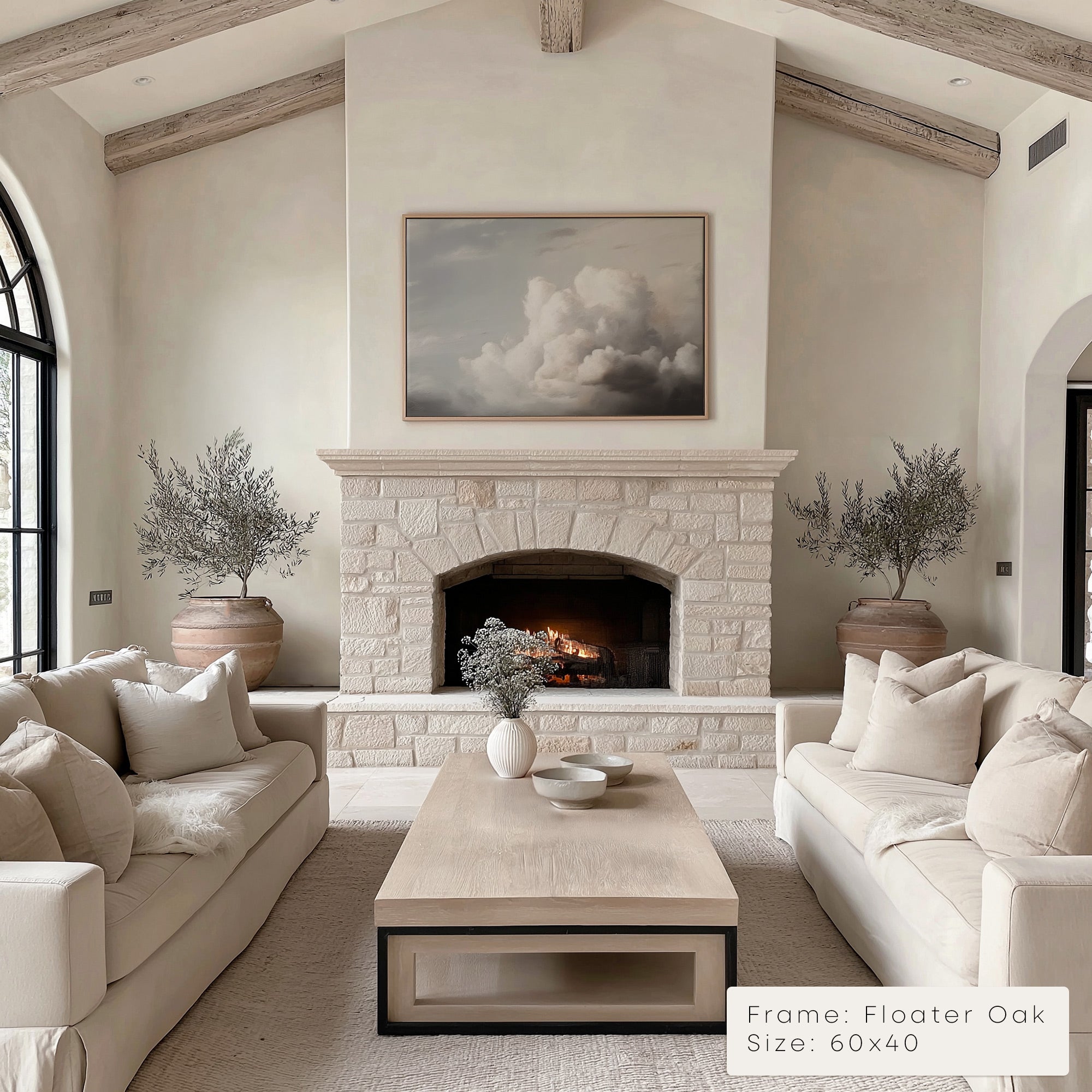 Living room with stone fireplace, beige sofas, and a coffee table. __lifestyleImage