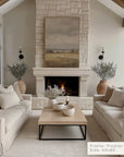 living room with a fireplace, beige sofas, and decorative elements. __lifestyleimage