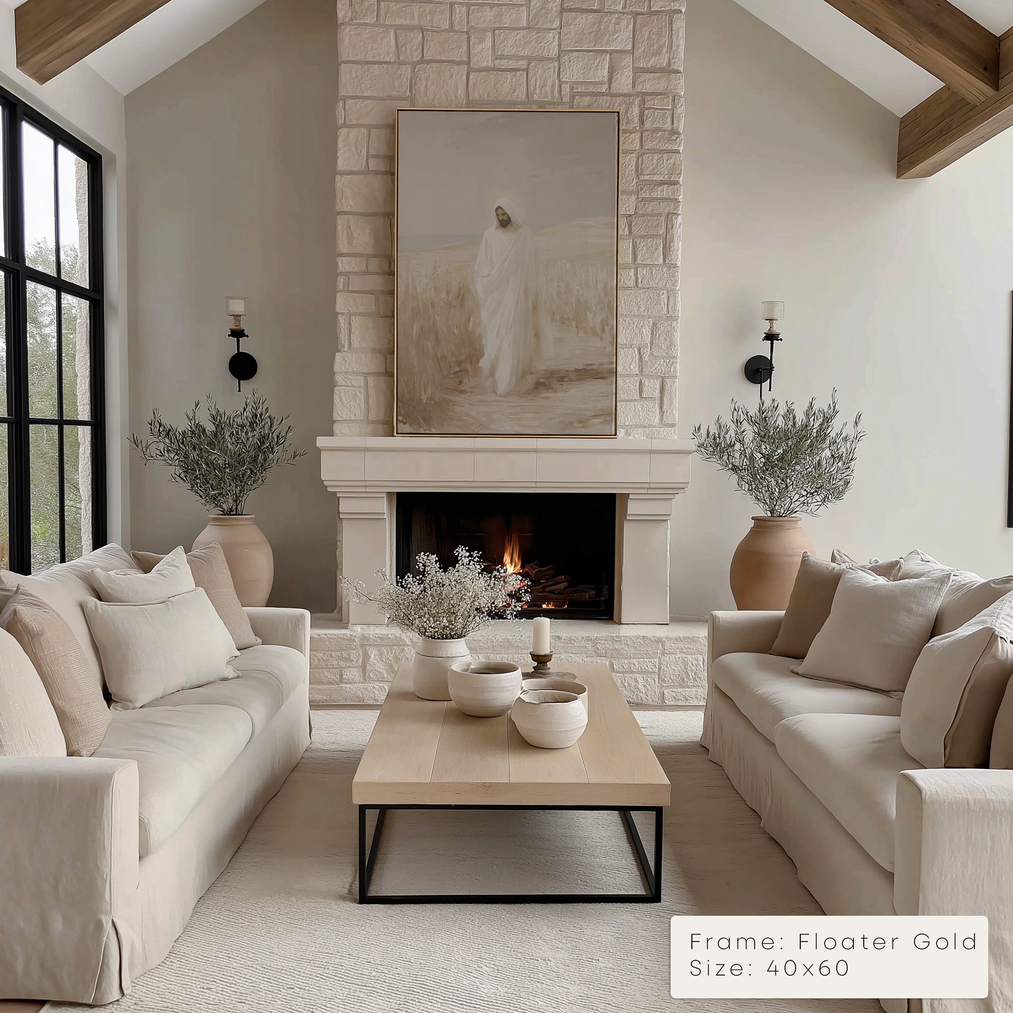 Modern living room with a fireplace, beige sofas, and decorative elements.