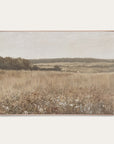 framed landscape painting of a field with trees and sky. 