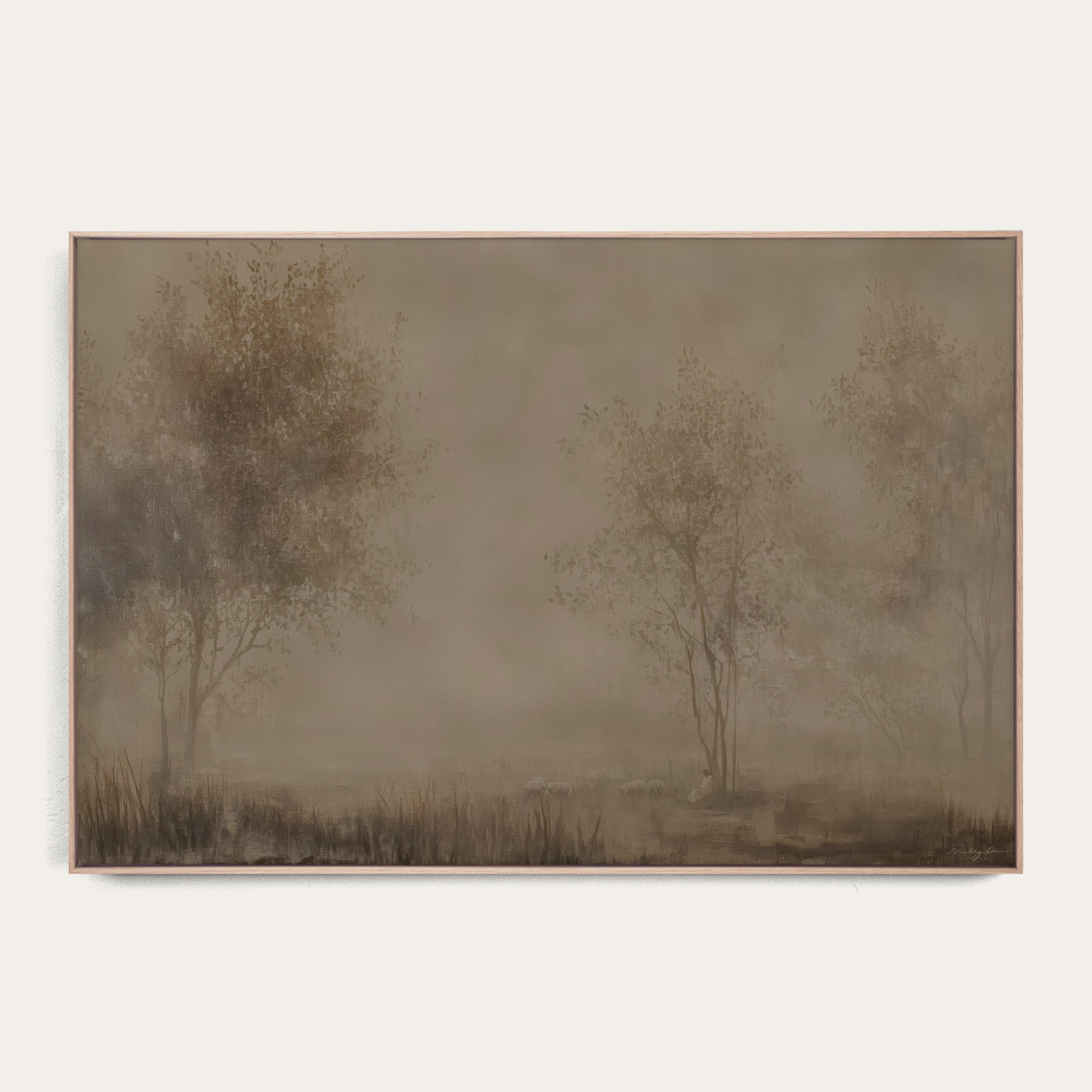 Framed artwork of a misty landscape with trees on a white background 