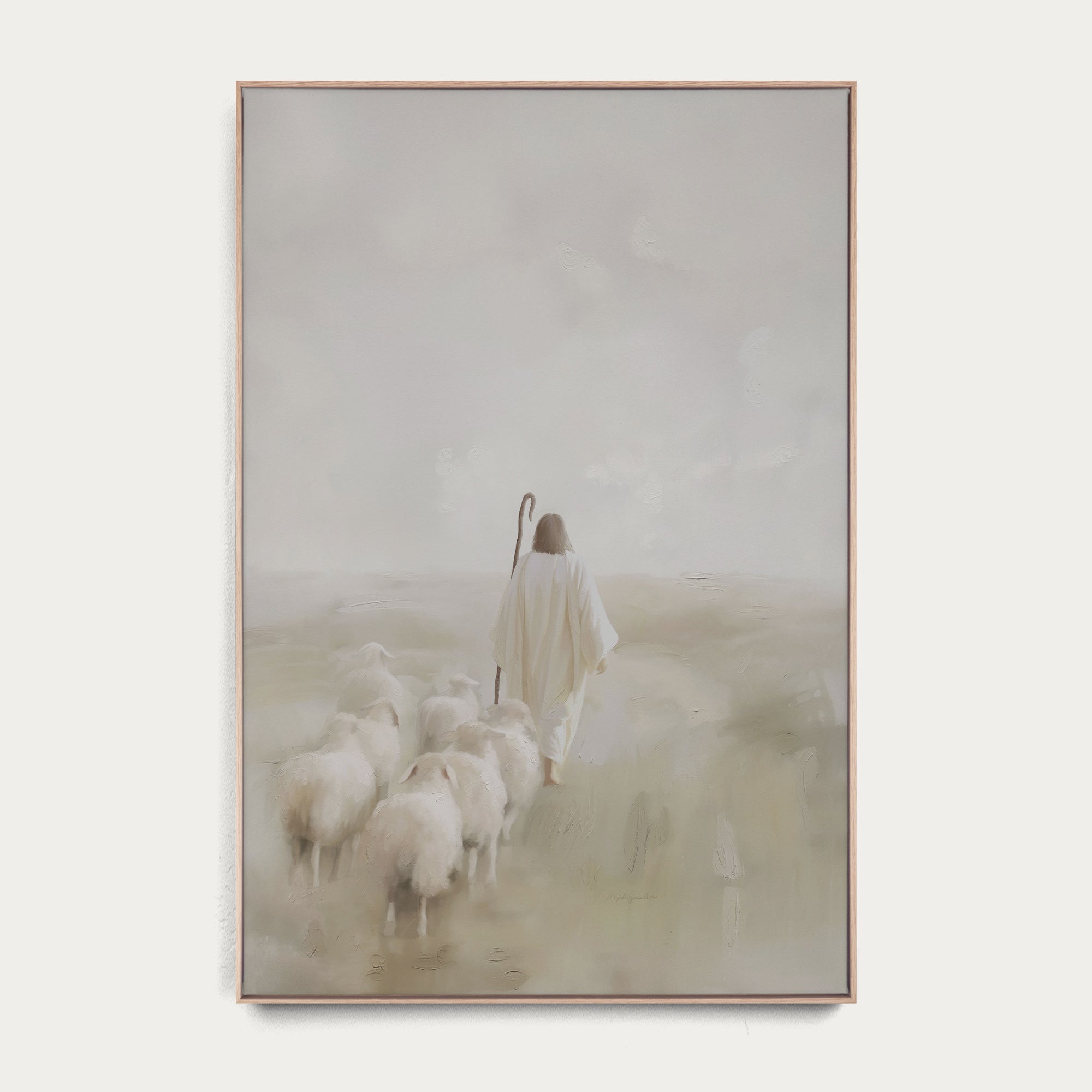 Framed artwork of a shepherd with sheep in a misty landscape 