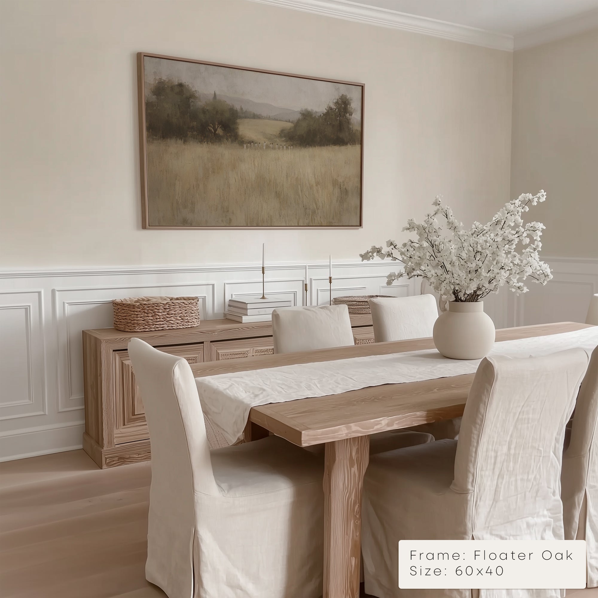 Dining room with wooden table, chairs, and a painting on the wall.