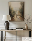 decorative interior setting with a table, lamp, and vase against a wall with a painting.