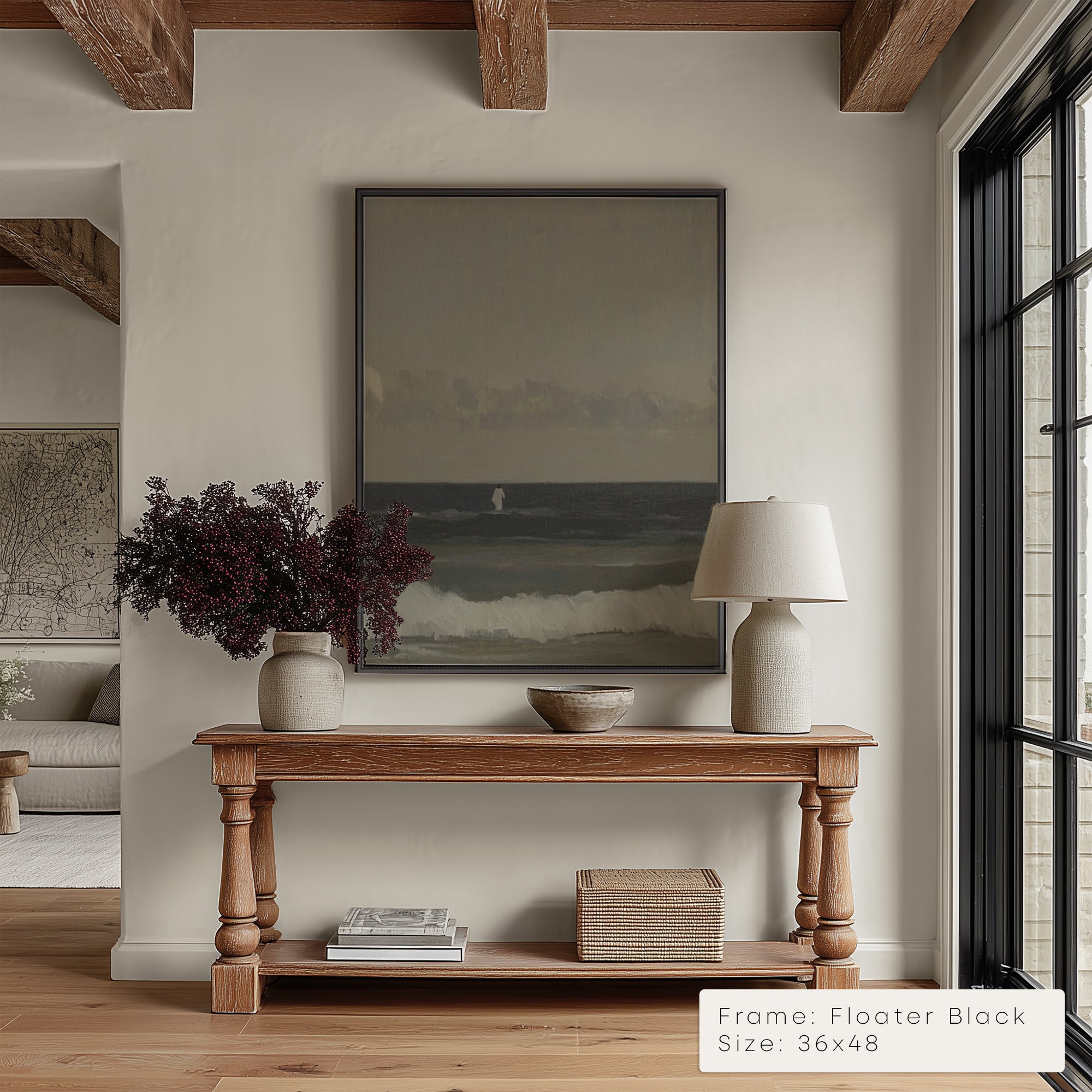Living room with wooden console table, framed artwork, and decorative items. __lifestyleImage