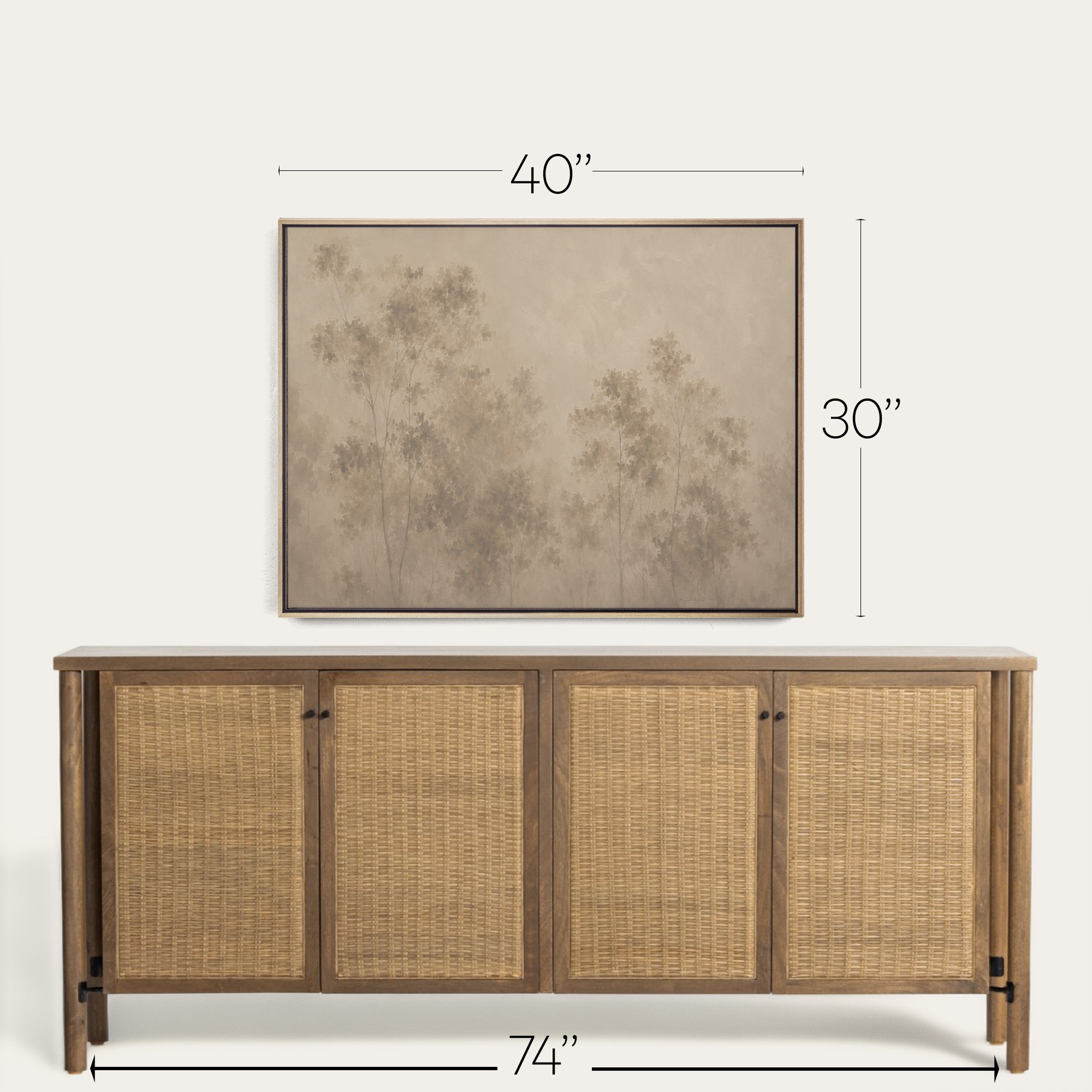A framed wall art print showing a muted tree scene, displayed above a wooden sideboard with woven cane doors. White dimension lines and text indicate the artwork is 40 by 30 inches, with the sideboard measuring 74 by 58 inches. 