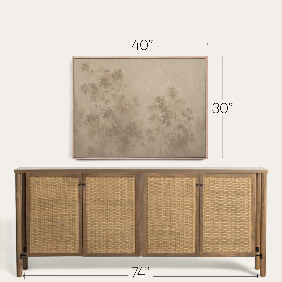 A framed wall art print showing a muted botanical scene with trees, displayed above a wooden sideboard with woven cane doors. White dimension lines and text indicate the artwork is 40 by 30 inches, with the sideboard measuring 74 by 48 inches. 