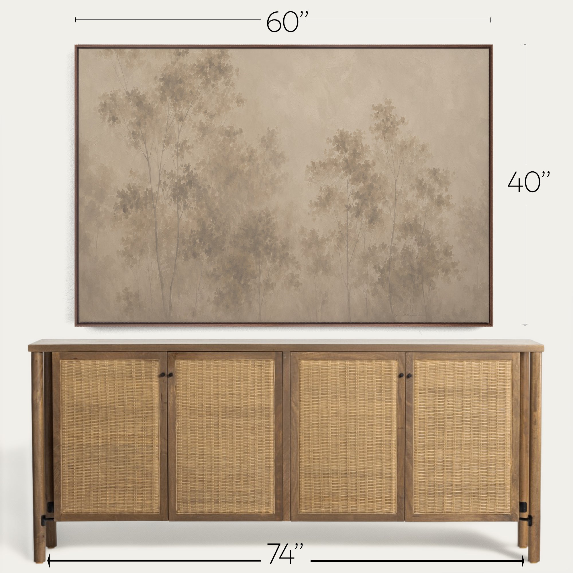 A framed wall art print showing a muted beige forest scene, displayed above a wooden sideboard with woven cane doors. Dimension labels indicate 60 inches wide by 40 inches tall for the artwork, and 74 inches wide for the sideboard. 