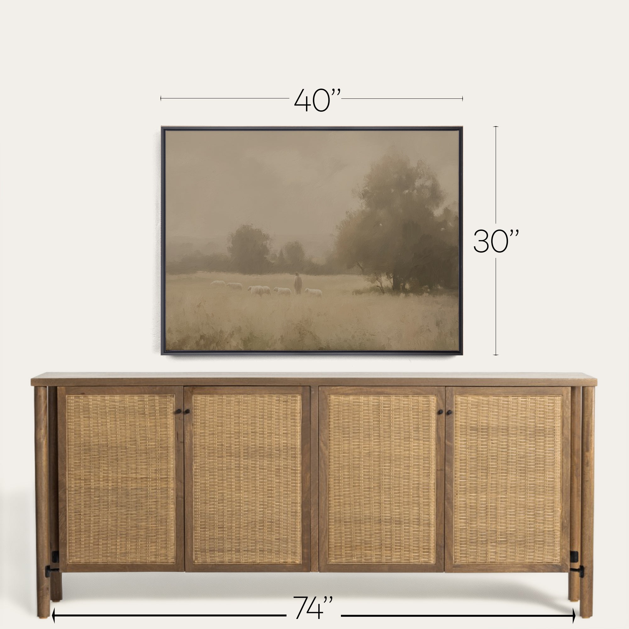 Wooden sideboard with wicker doors and framed landscape art above it, with measurements indicated. 