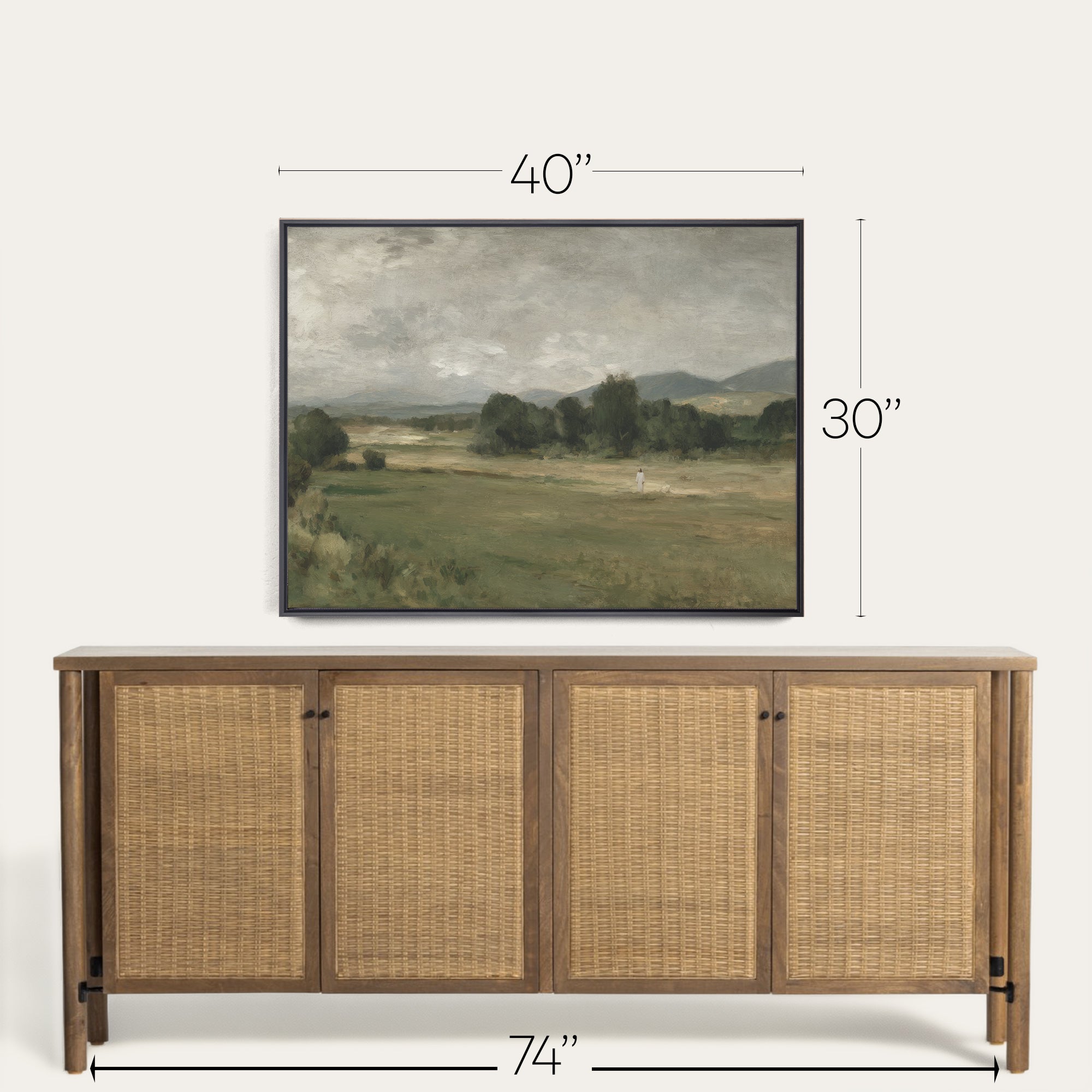 Wooden sideboard with wicker doors and framed landscape painting above, with dimensions indicated. 