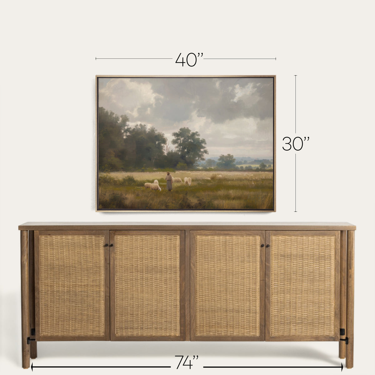 Wooden sideboard with wicker doors and a framed landscape painting above it, with dimensions indicated. 
