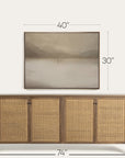 wooden sideboard with wicker doors and mounted television displaying a mountain scene, with dimensions indicated. 