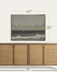 wooden sideboard with wicker doors and framed artwork above on a white background 