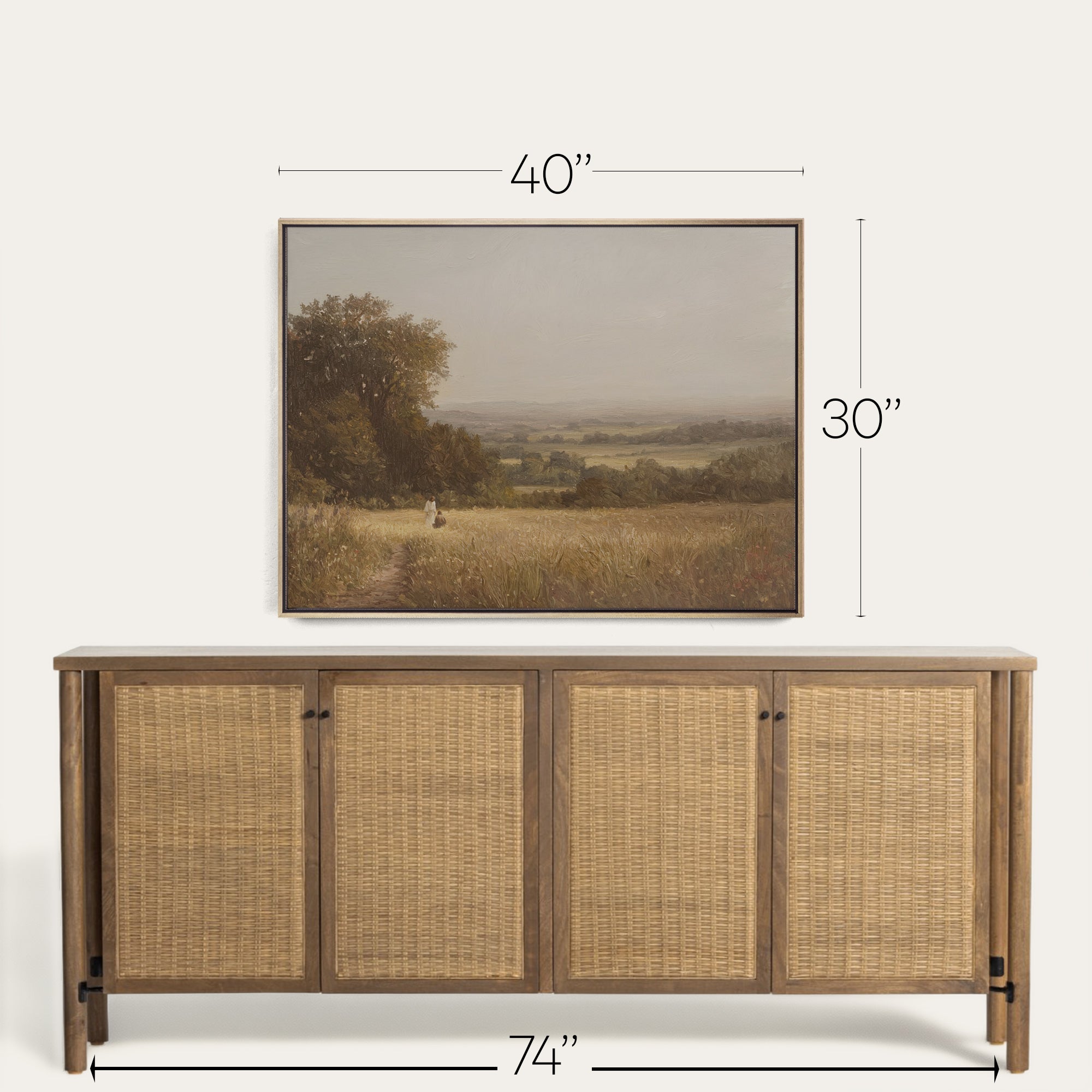 Wooden sideboard with wicker doors and a framed landscape picture above it, with dimensions indicated. 