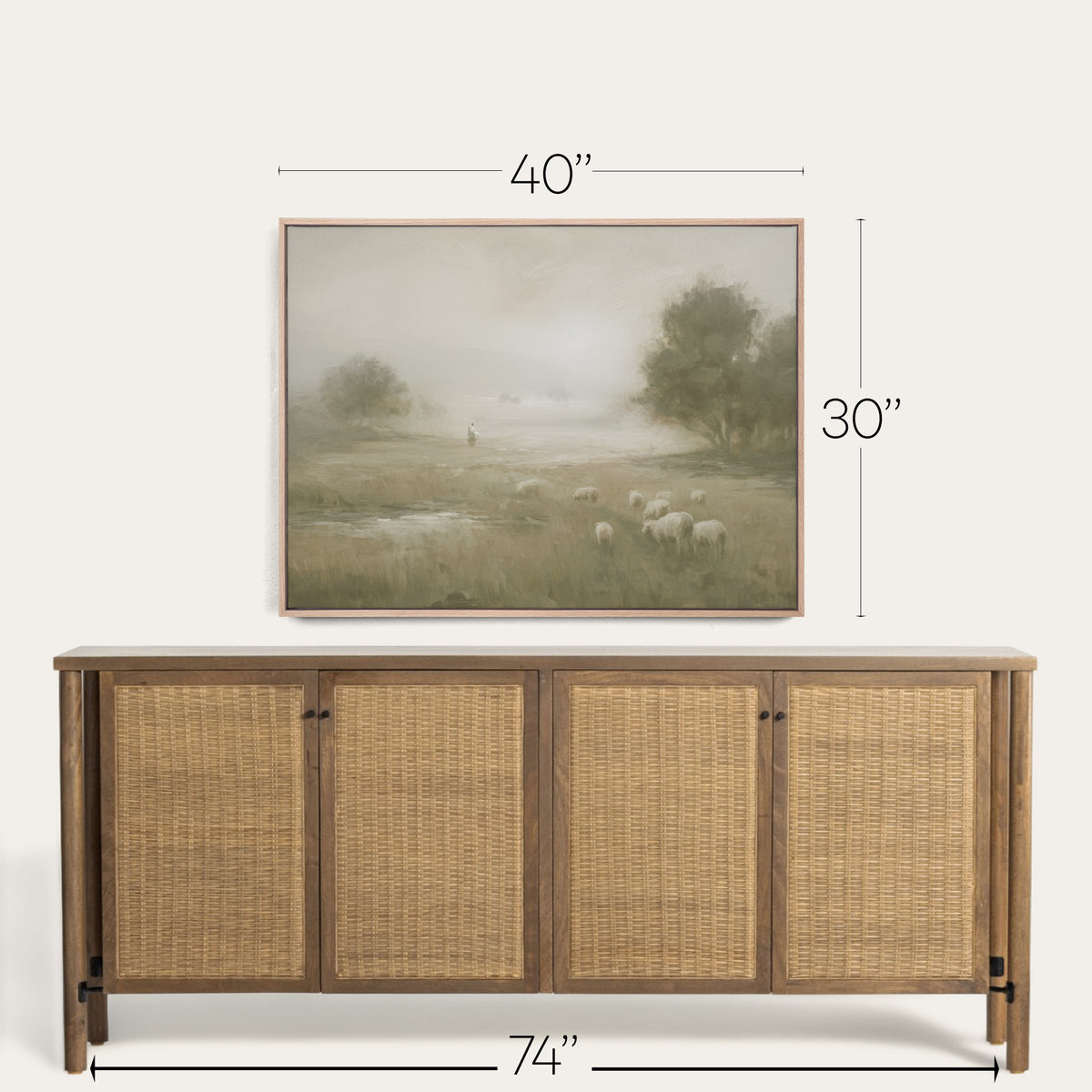 Wooden sideboard with wicker doors and a framed landscape painting above it, with dimensions indicated. 