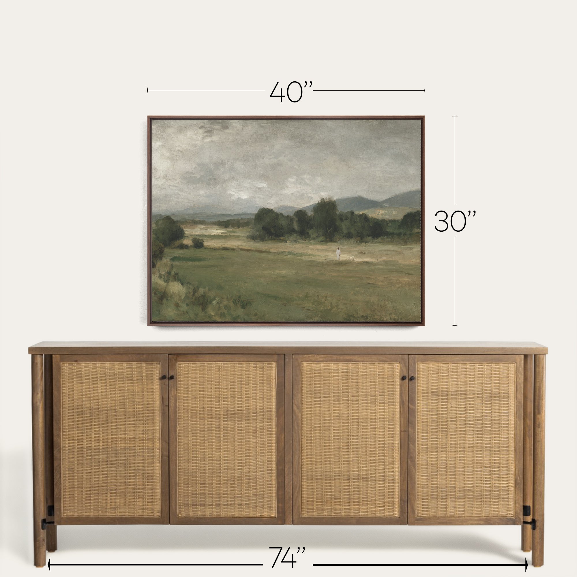 Wooden sideboard with wicker doors and framed landscape painting above, with dimensions indicated. 
