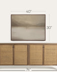 wooden sideboard with wicker doors and mounted television displaying a mountain scene, with dimensions indicated. 