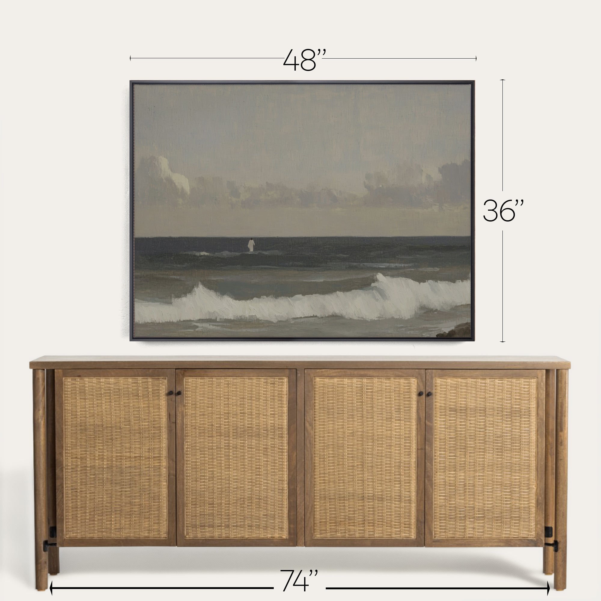 Wooden sideboard with wicker doors and framed artwork above it, showing dimensions. 