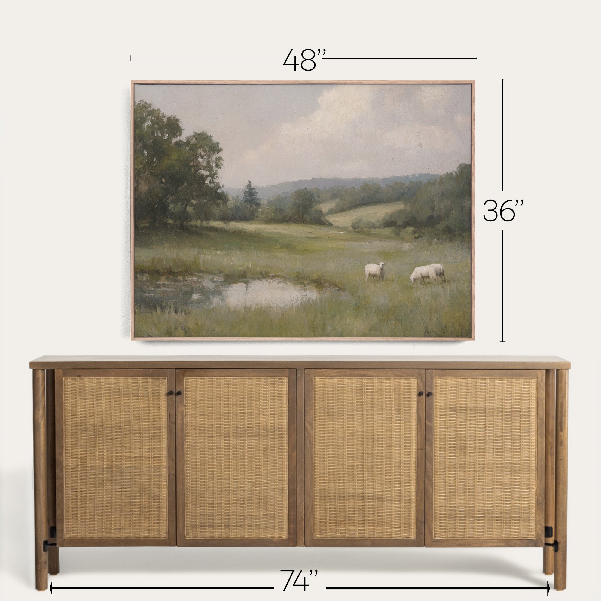 Framed landscape painting above a wooden sideboard with dimensions indicated. 