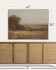 framed landscape painting above a wooden sideboard with dimensions indicated. 