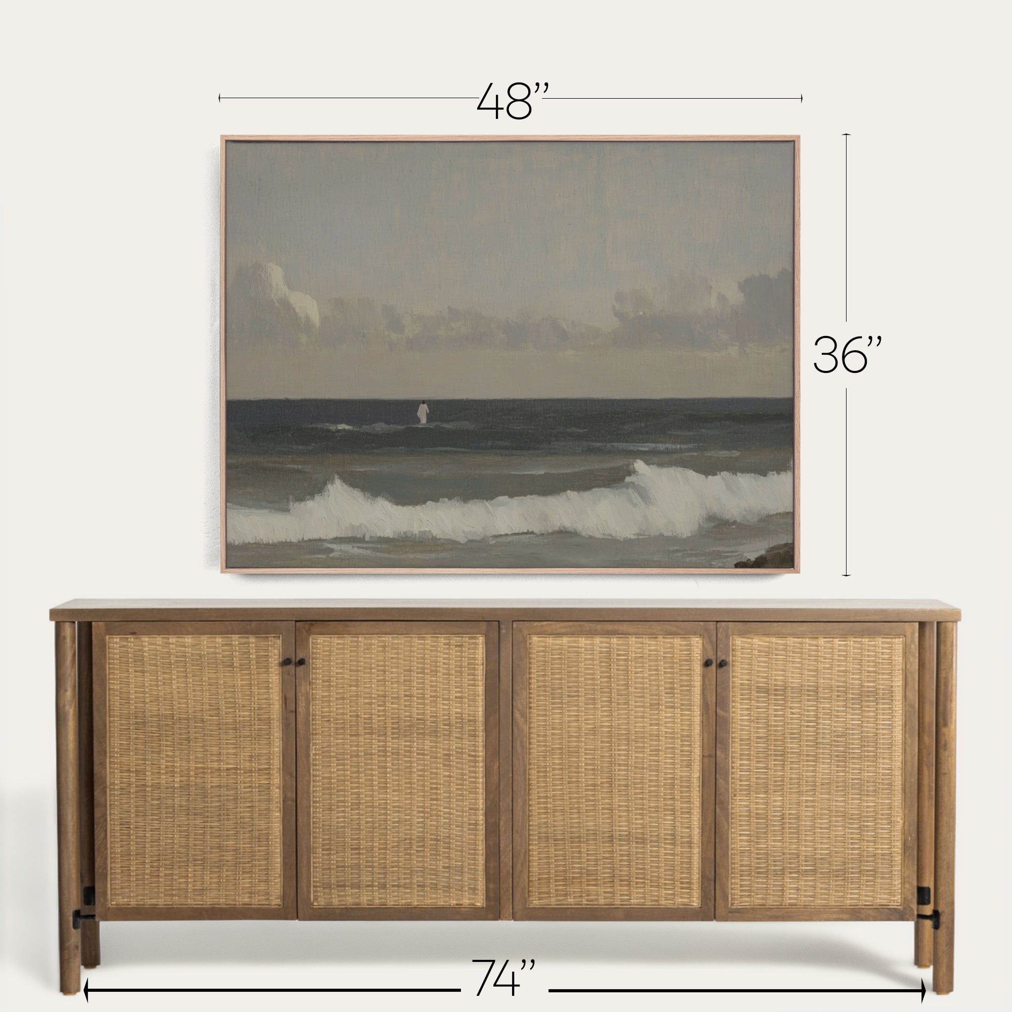 Wicker sideboard with framed artwork above it, showing dimensions. 