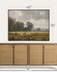 framed landscape painting above a wooden sideboard with dimensions indicated. 
