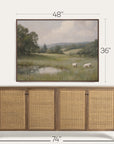 framed landscape painting above a wooden sideboard with dimensions indicated. 