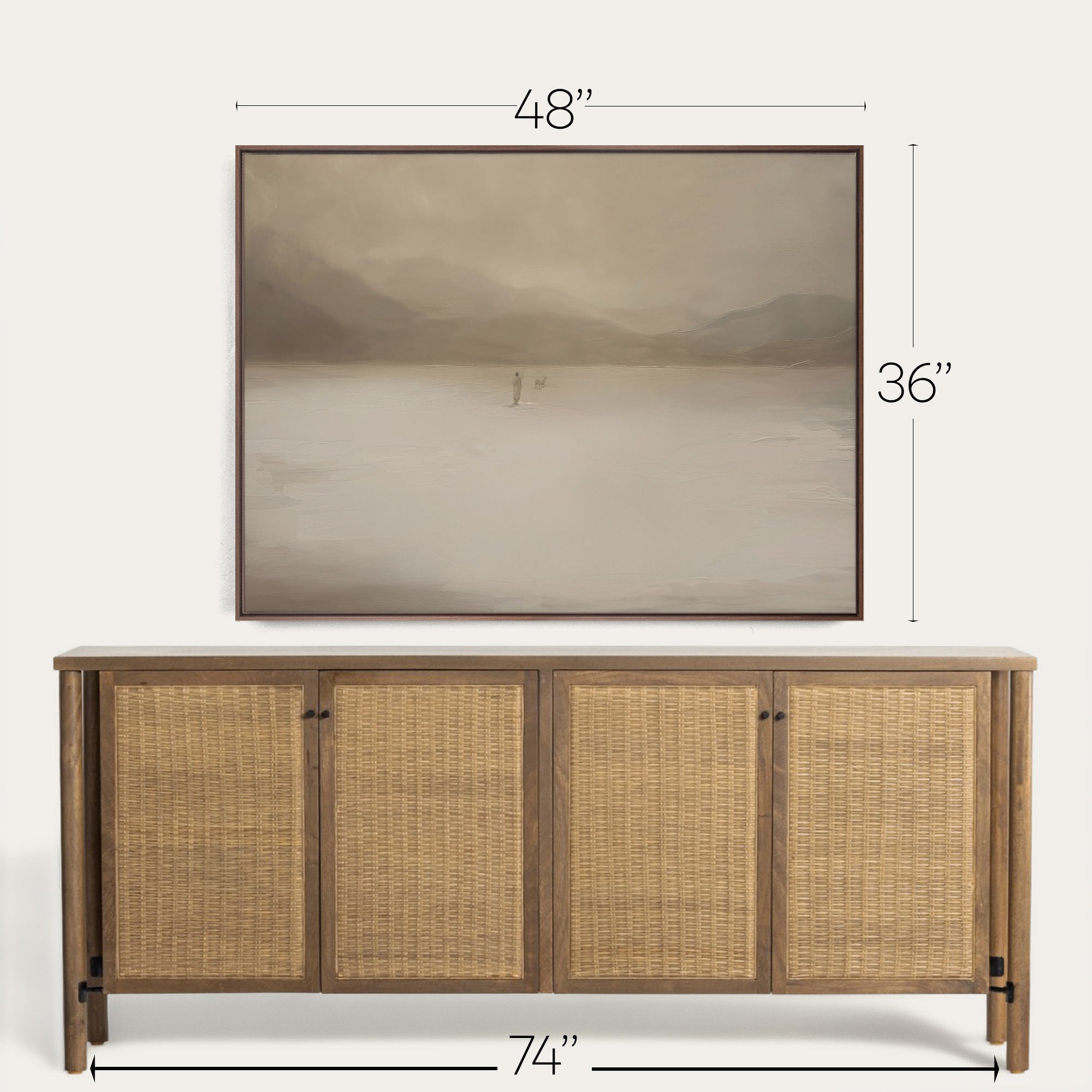 Wooden sideboard with wicker doors and dimensions displayed above a framed landscape painting. 
