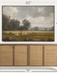 framed landscape painting above a wooden sideboard with dimensions displayed. 