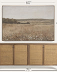 wicker sideboard with dimensions displayed above a landscape painting 
