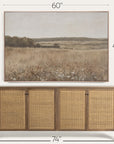 wicker sideboard with framed landscape painting above it, showing dimensions. 