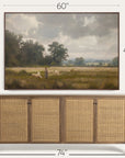 framed landscape painting above a wooden sideboard with dimensions displayed. 