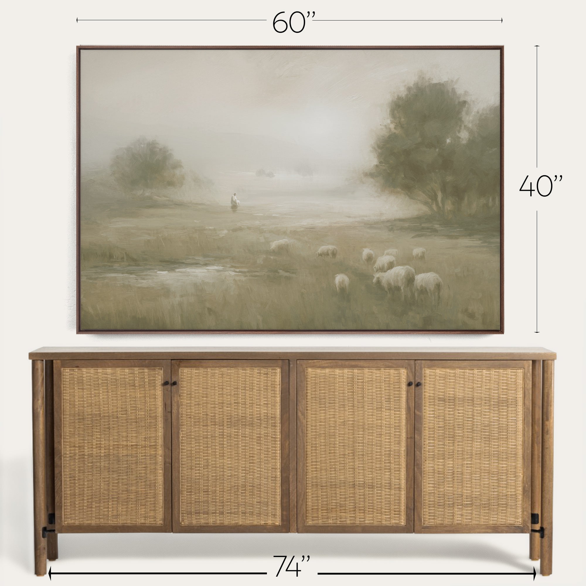 Framed artwork of a pastoral scene above a wooden sideboard with rattan doors. 