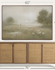 framed artwork of a pastoral scene above a wooden sideboard with rattan doors. 
