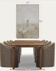wooden dining table with four curved brown chairs, and a framed picture above on a white background. 