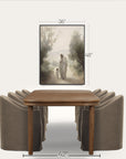 dining room setup with a wooden table and gray chairs, featuring a framed artwork above. 