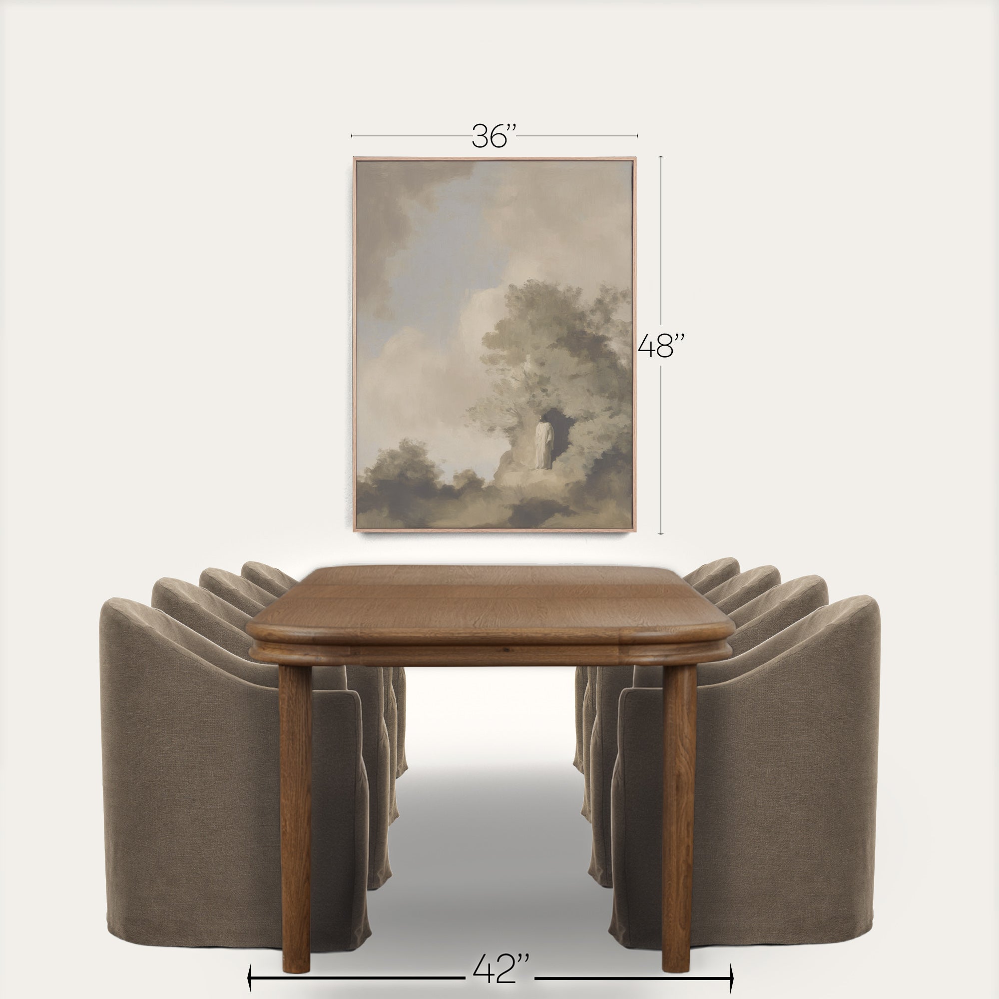 Wooden dining table with four gray chairs and a framed landscape painting on a white background. 